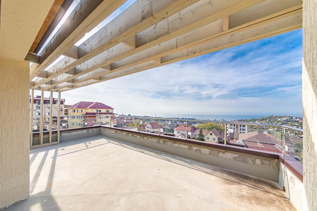 Двухэтажный коттедж на участке 4 сотки