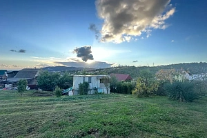 Великолепный участок с видом на море и горы