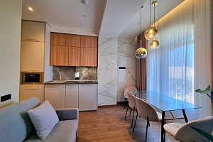 Двухуровневый апартамент на берегу моря